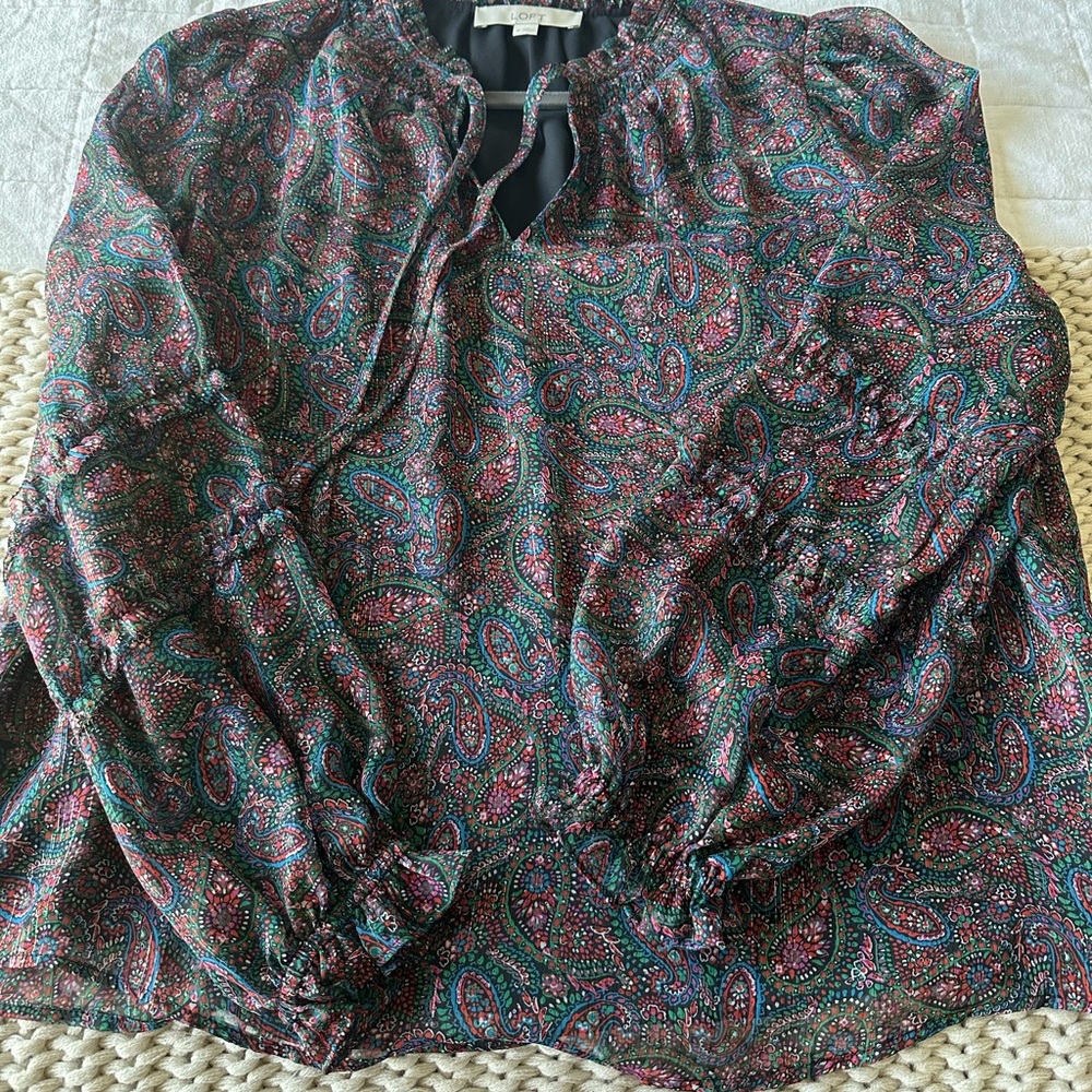 Loft Blouse. Never worn. Sleeves are sheer and have ruffle detail